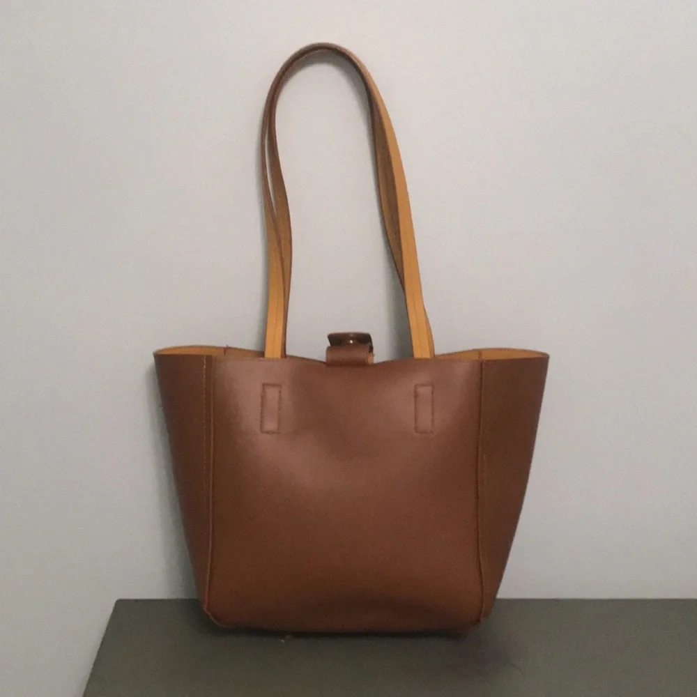 Tommy Bahama Reversible Faux Leather Tote Wristlet - Picture 9 of 16